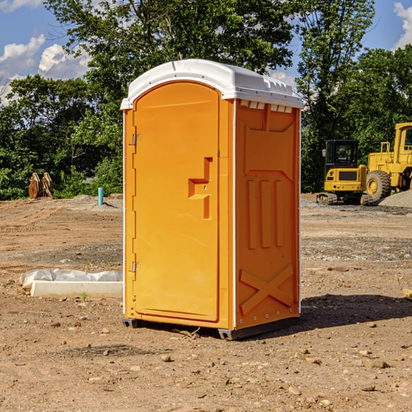 how often are the portable restrooms cleaned and serviced during a rental period in Charles City IA